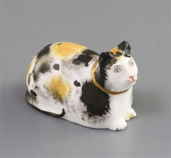 A rare Copeland & Garrett porcelain figure of a recumbent cat, c.1833-47, L. 6cm, ear chips